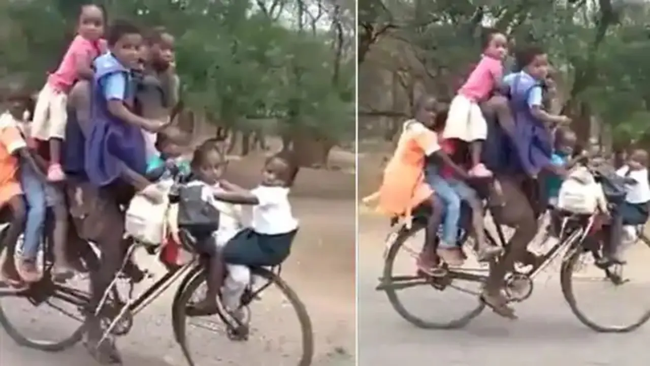 trending Video, viral video, Cycle stunt video, 9 kids on one cycle, viral kids video, shocking video, many kids on cycle video, trending cycle stunt video, life in danger video