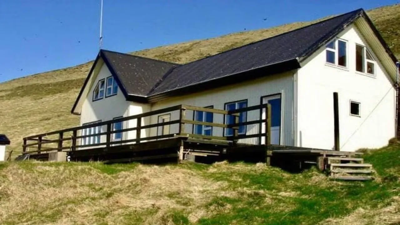 Photos of a tiny white house, standing all alone on a remote island, are currently going viral online and giving rise to mysterious theories. Dubbed the world's loneliest house,