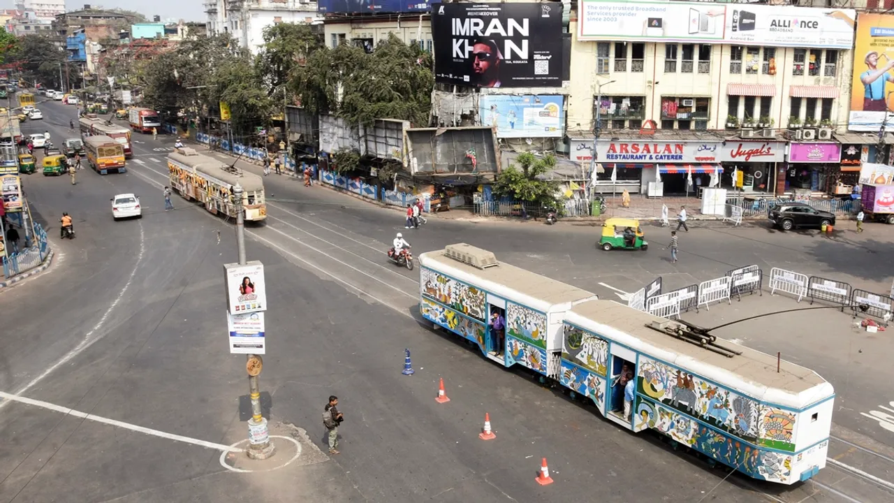 Colourful trams travel across the city displaying artworks celebrating the 150th anniversary of Kolkata's trams