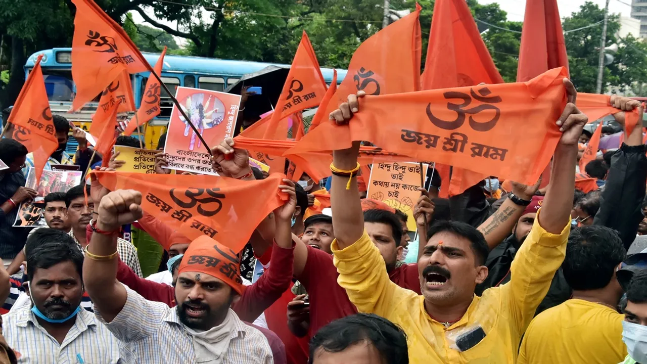 VHP supporters raise slogans during a protest against the killings of minorities