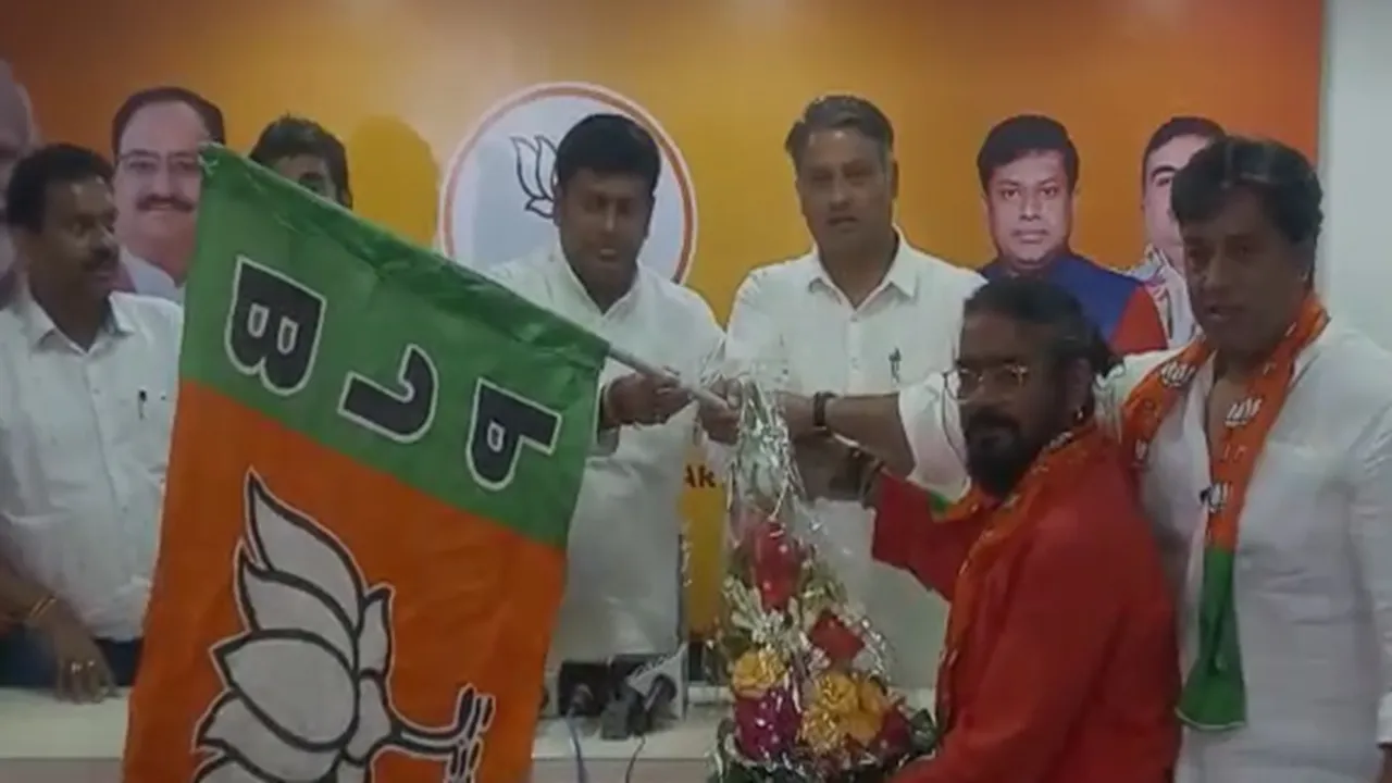purna das baul son dibyendu join bjp , পূর্ণদাস বাউলের জমি জবর-দখল বিতর্কের মাঝেই বিজেপিতে যোগ শিল্পীর ছেলের