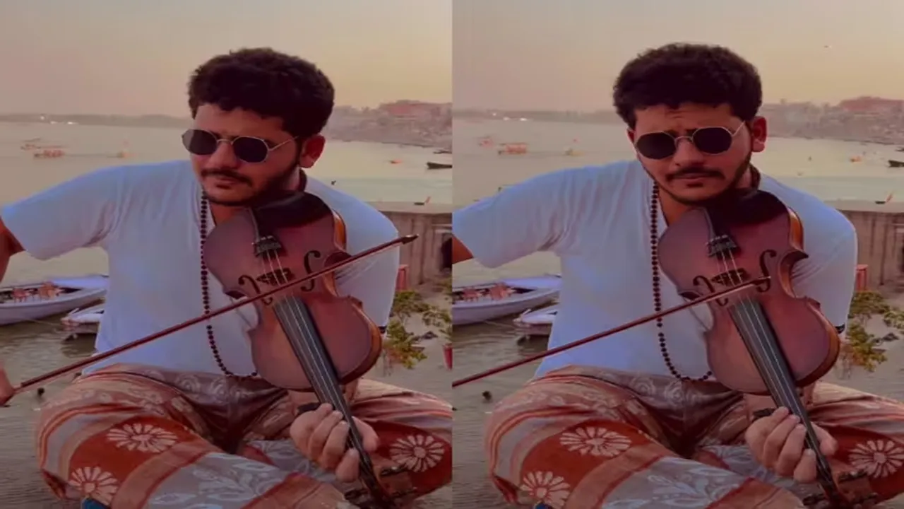 viral video,trending Video, violin video, musical video, banaras news, up news, mumbai news, viral news, viral video, man playing violin at banaras ghat, viral video of banaras ghat, trending video, music, music lover, musical instrument, social media, viral reel