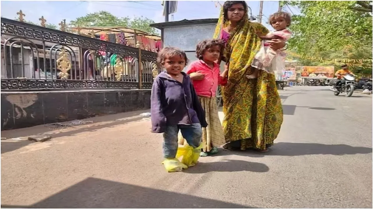 MP woman, wraps plastic, kids’ feet, hot roads
