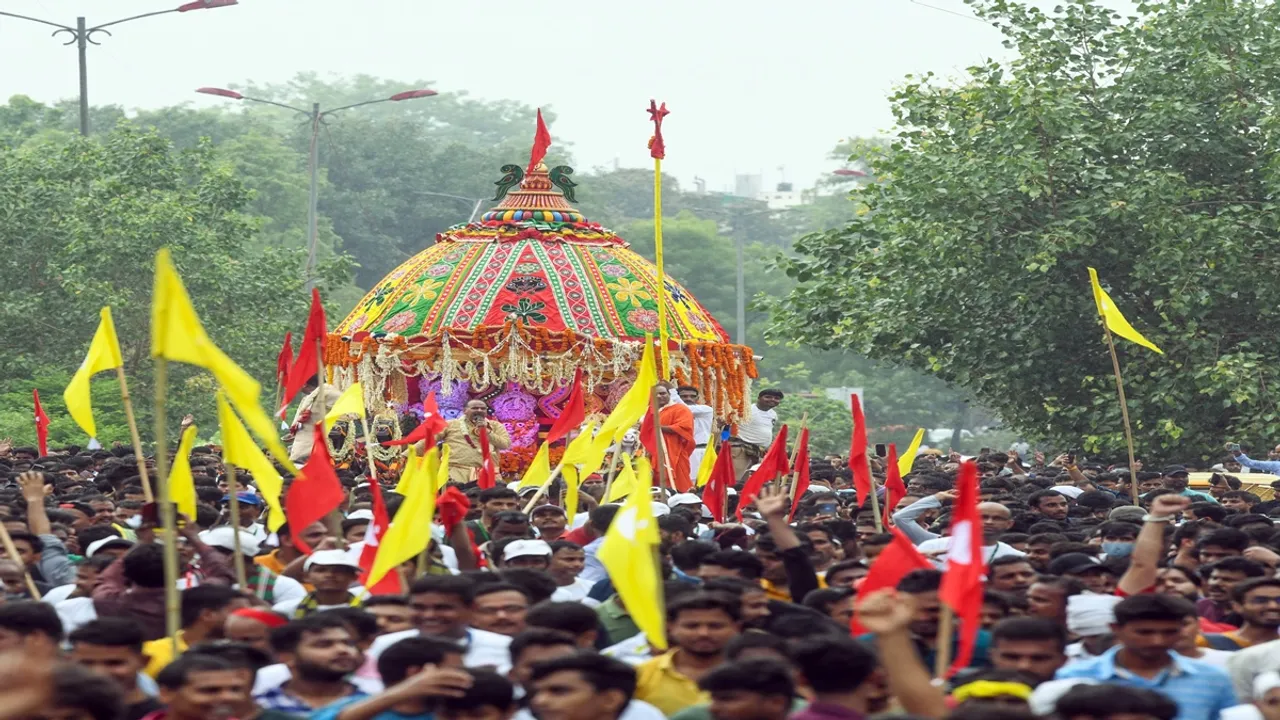 Devotees pull the chariot of Lord Jagannath, Balabhadra and Goddess Subhadra during the annual Rath Yatra