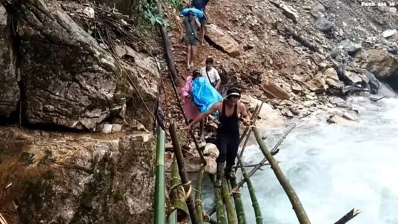 Arunachal Pradesh, Arunachal Pradesh’s Siang district, dying woman carried across treacherous terrain, express special, express premium, Indian Express, India news, current affairs