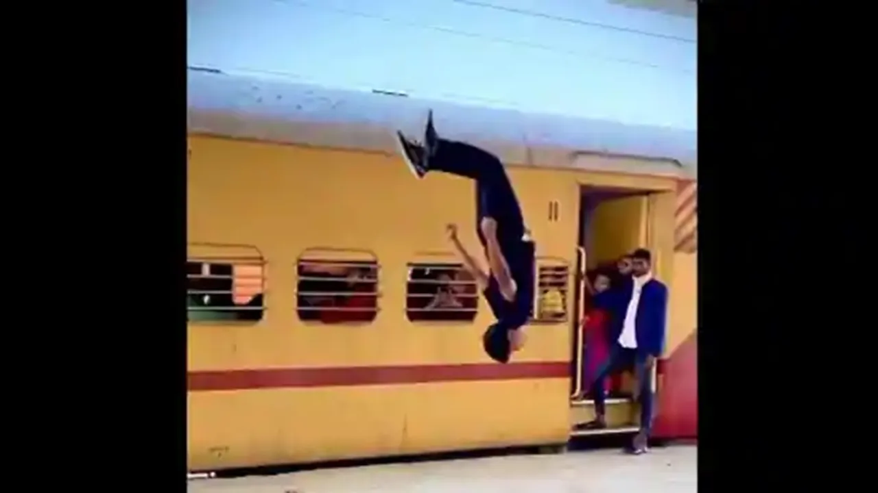Man,cartwheel,railway station,Twitter,video,viral