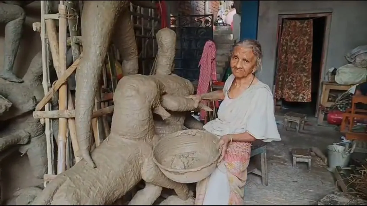 potter is infected with dengue thats why his old mother is making a Durga idol