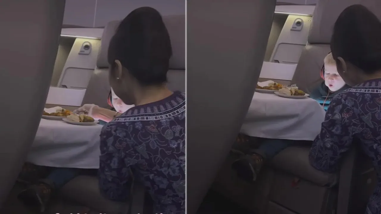 Flight attendant feeds kid,viral video,trending news,viral news