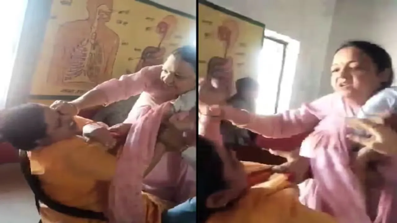 principal teacher brawl agra"," school principal teacher fight agra"," school principal teacher fight over being late"," agra school fight