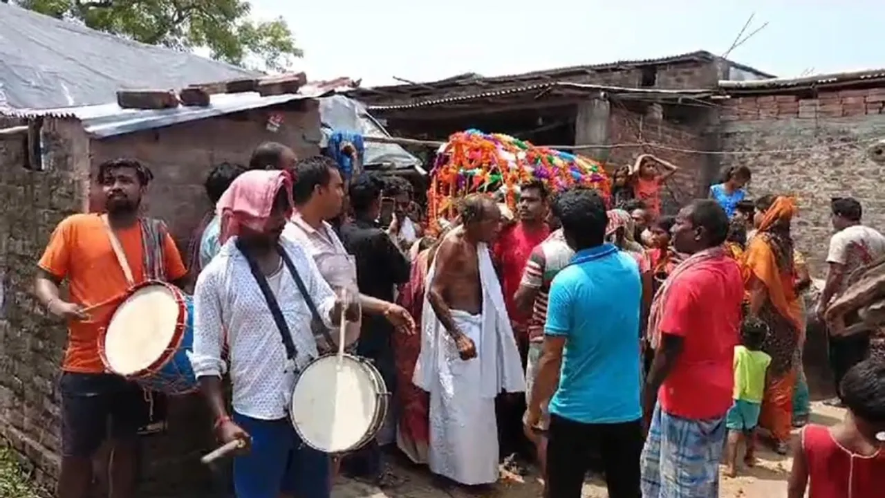 After the death of old woman the cremation procession was followed by beating of drums