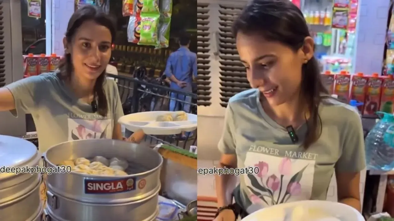 "Momos waali, momos waali ladaki, momos girl, momos waali girl, momos waali ladaki ka video, momos girl video, momos waali ke video, momos waali girl viral video, momos vendor, Famous momos seller, famous momos in delhi, famous momos in noida, viral video, viral girl, viral momos girl, viral news, trending video, trending news, social media,