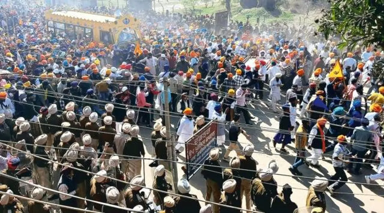 Waris Punab De group's leader Amritpal Singh's (not pictured) supporters break barricades and enter the police station demanding release of Amritpal Singh's supporter, in Ajnala near Amritsar. February 23 2023. EXPRESS PHOTO