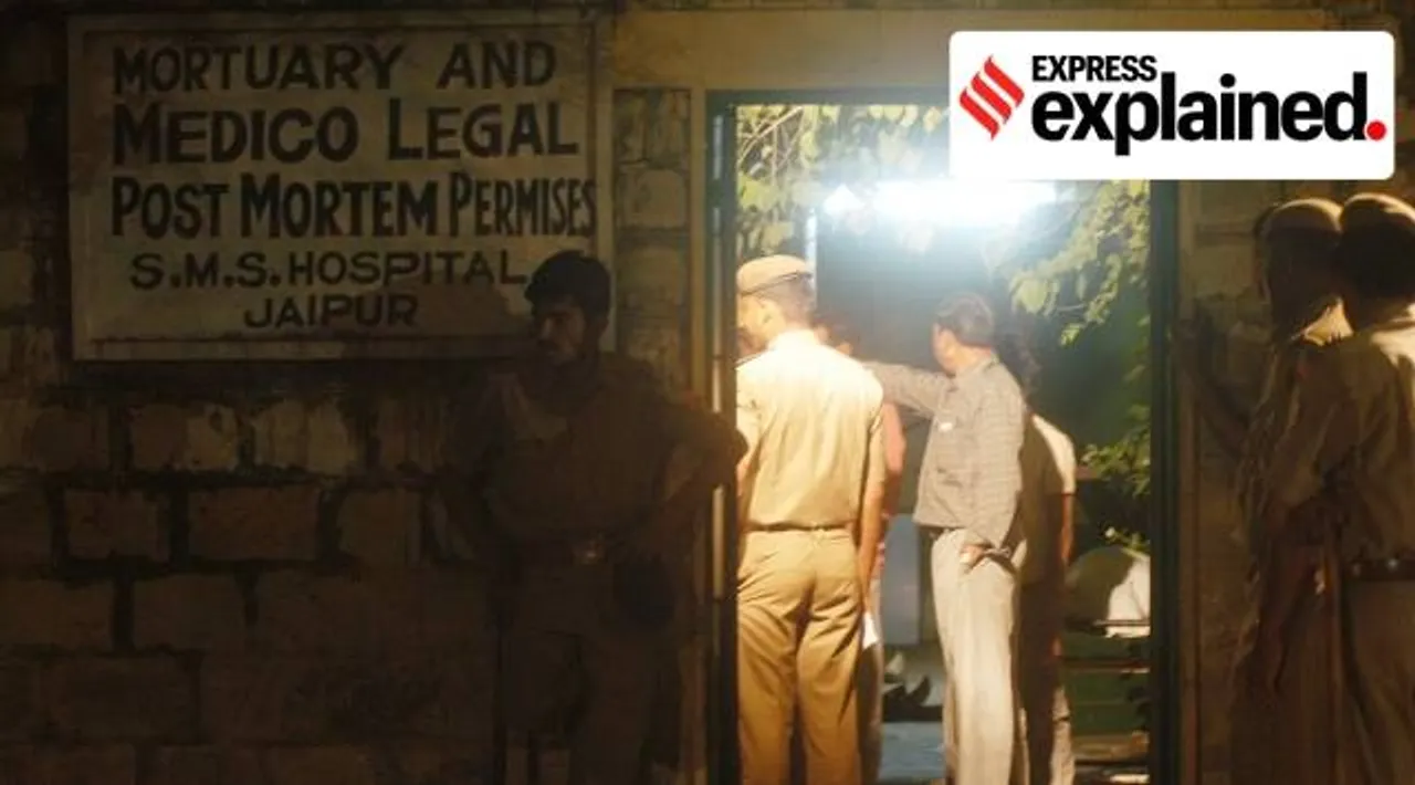 Policemen outside the SMS Hospital mortuary after the blasts. (Photo by Anil Sharma/Express Archive) Listen to this article
