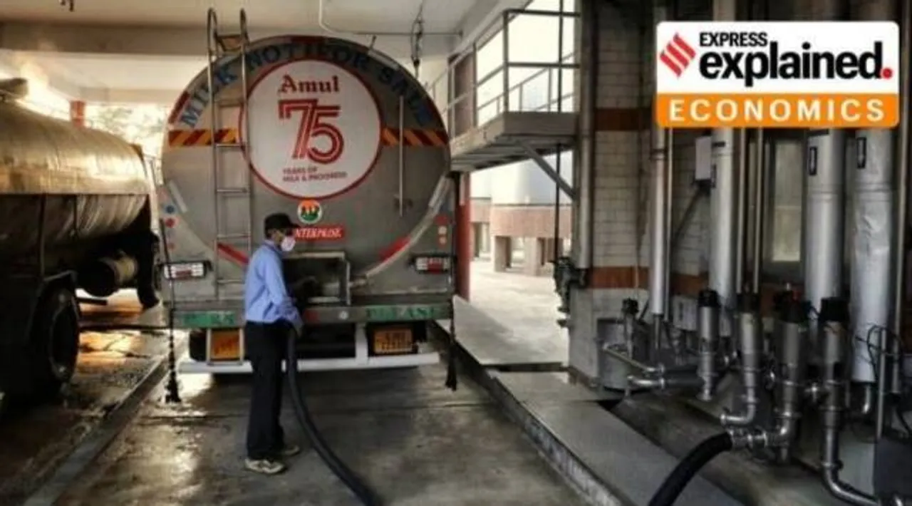 A milk tanker is filled at the Amul dairy plant in Anand, Gujarat. (Express Photo: Nirmal Harindran)