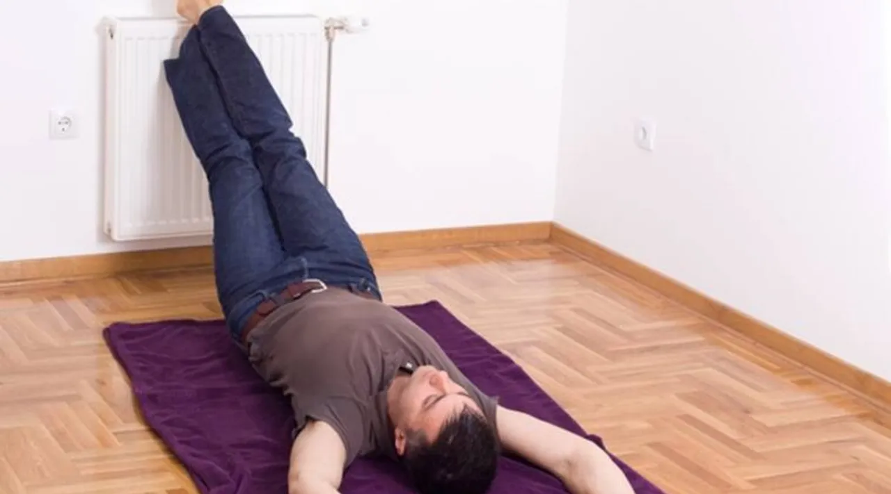 Did you ever think a wall in our house could be the perfect prop to help you with your yoga practice?