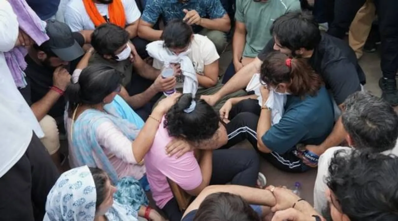 Wrestlers Sakshi Malik, Vinesh Phogat, Sangeeta Phogat and Bajrang Punia along with other contestants at Har Ki Pauri in Haridwar on Tuesday. (Express Pic Abhinav Saha)