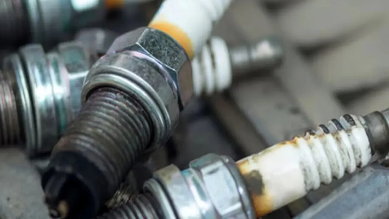 motorcycle spark plug change cost