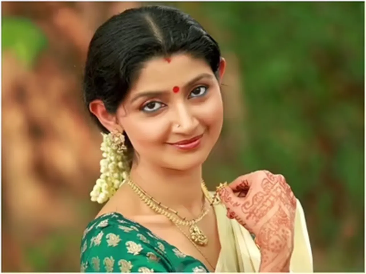 Divya Unni ng 1
