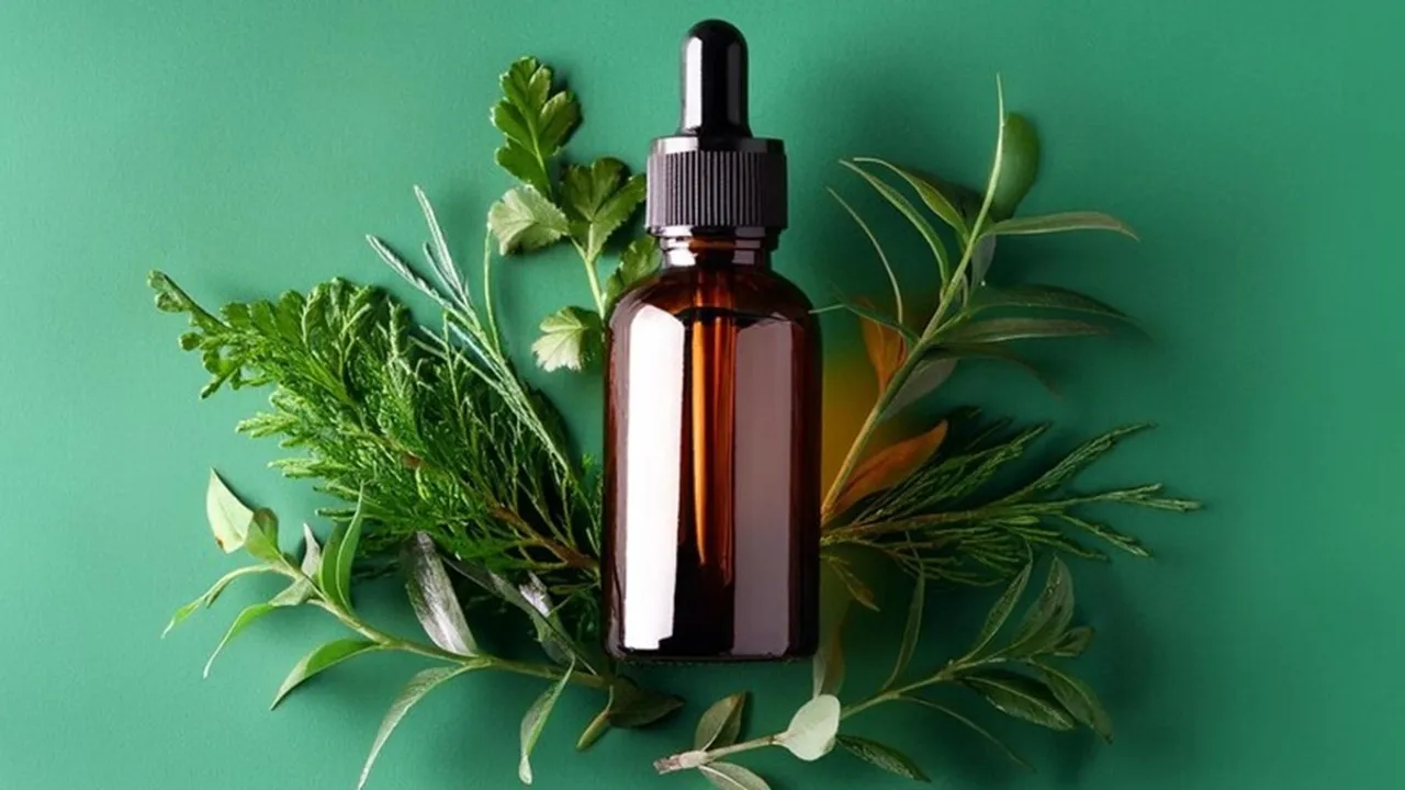 Homemade Herbal Hair Care Oil With Hibiscus And Leaves FI