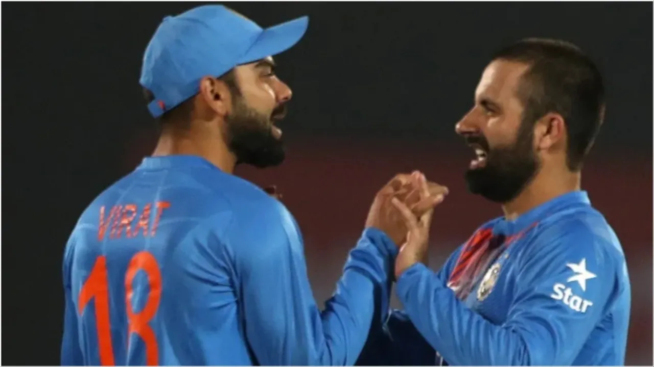 Virat Kohli and Parvez Rasool