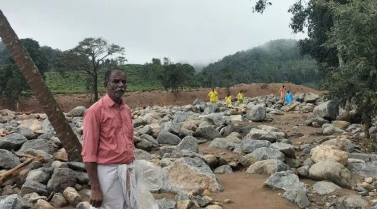 68-year-old Sivanandan looks for his relatives at Chooralmala village in Wayanad (Express Photo Shaju Philip)