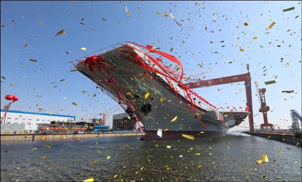 സൈനീക കരുത്ത് തെളിയിച്ച് ചൈന; സ്വന്തം മണ്ണിൽ നിർമ്മിച്ച വിമാനവാഹനി കപ്പൽ നീറ്റിലിറക്കി