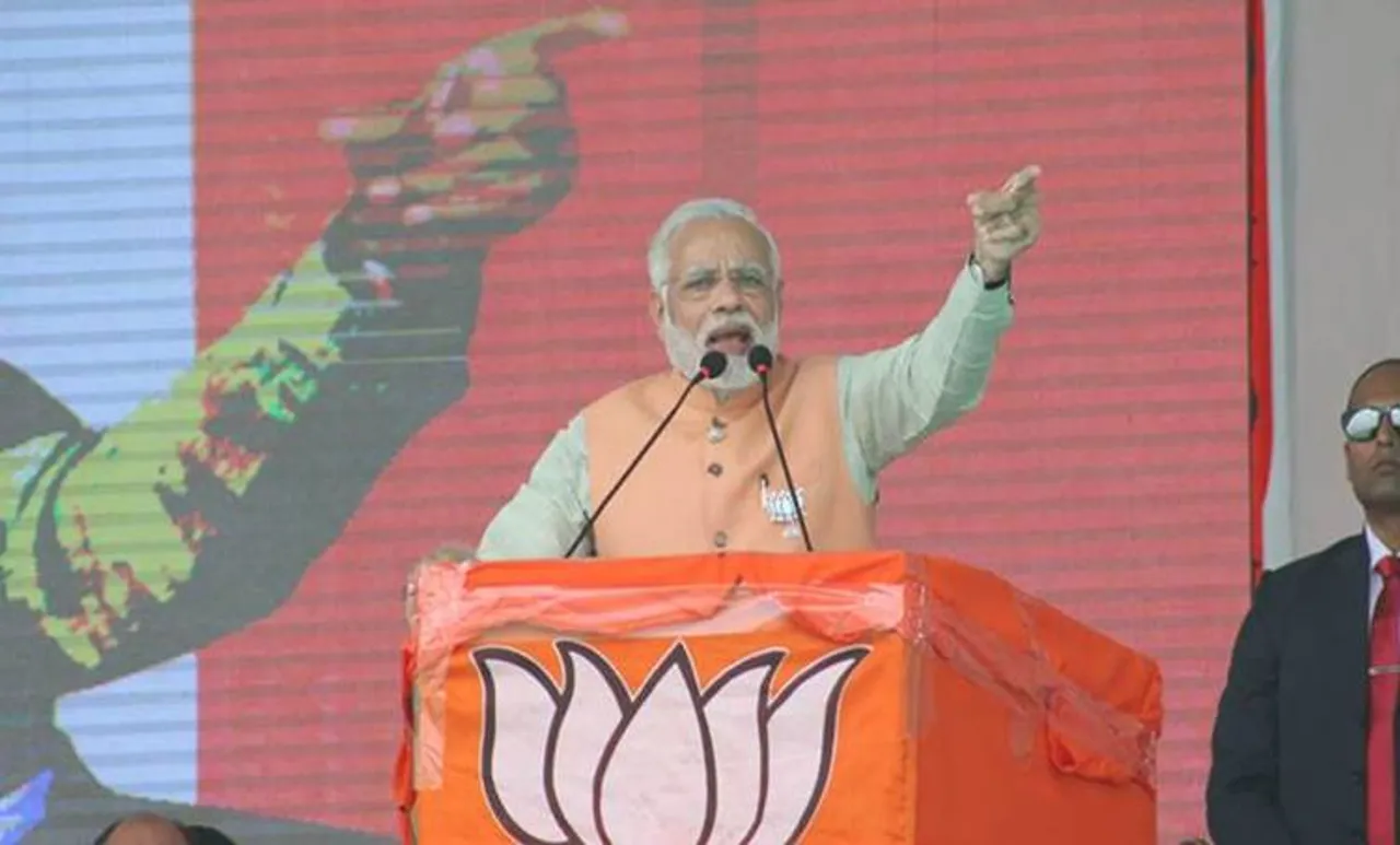 PM Narendra Modi addressing a public meeting at Surat. (Express photo by Hanif Malek) RE