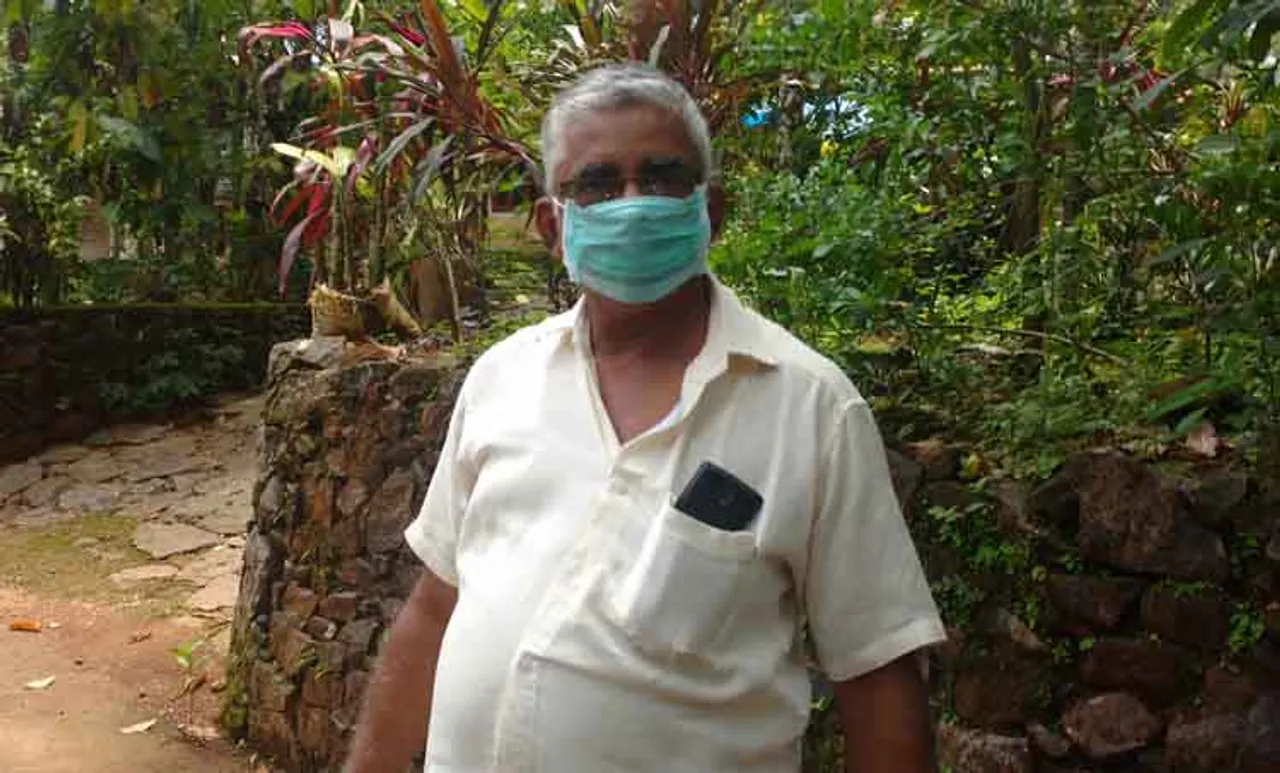 npah, A local hearing aa cloth mask in the village.