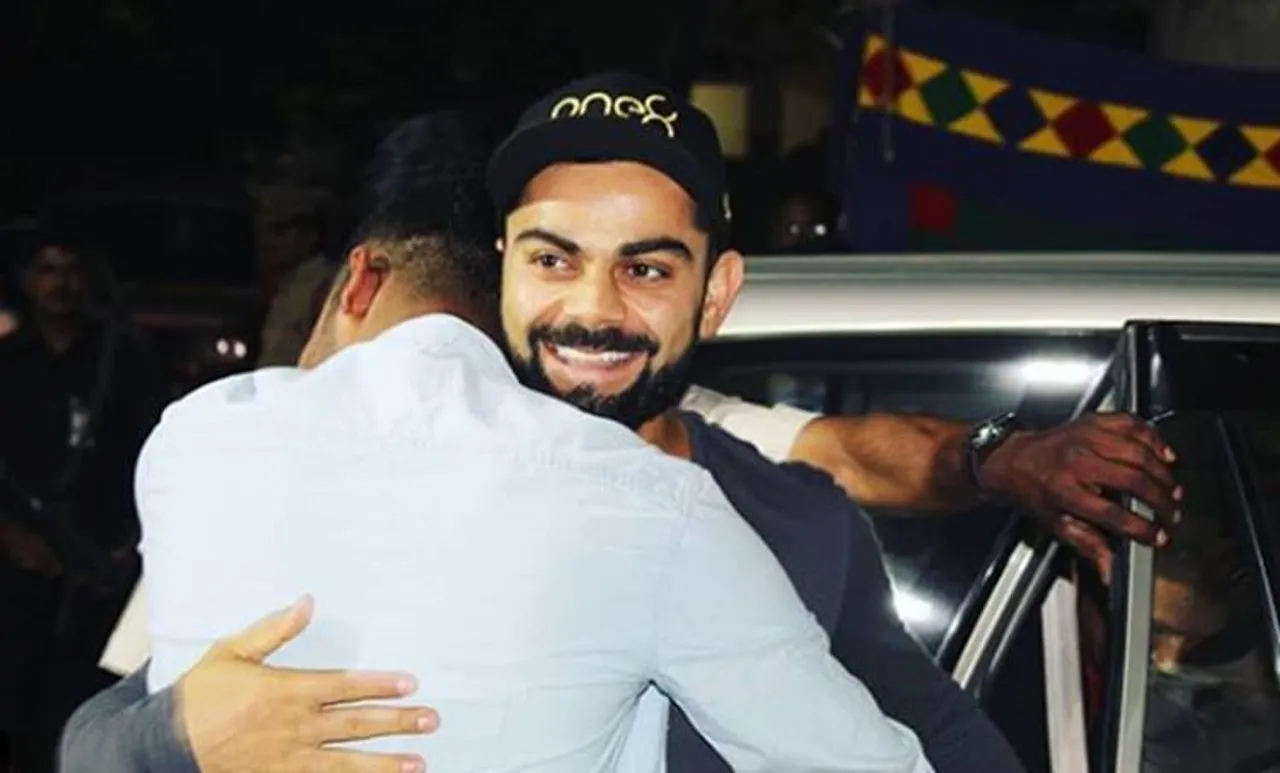 'നന്ദി വിരാട് ഭയ്യാ, മറക്കില്ല ഈ സമ്മാനം'; കോഹ്‌ലിയെ കെട്ടിപ്പിടിച്ച് വികാരഭരിതനായി സിറാജ്