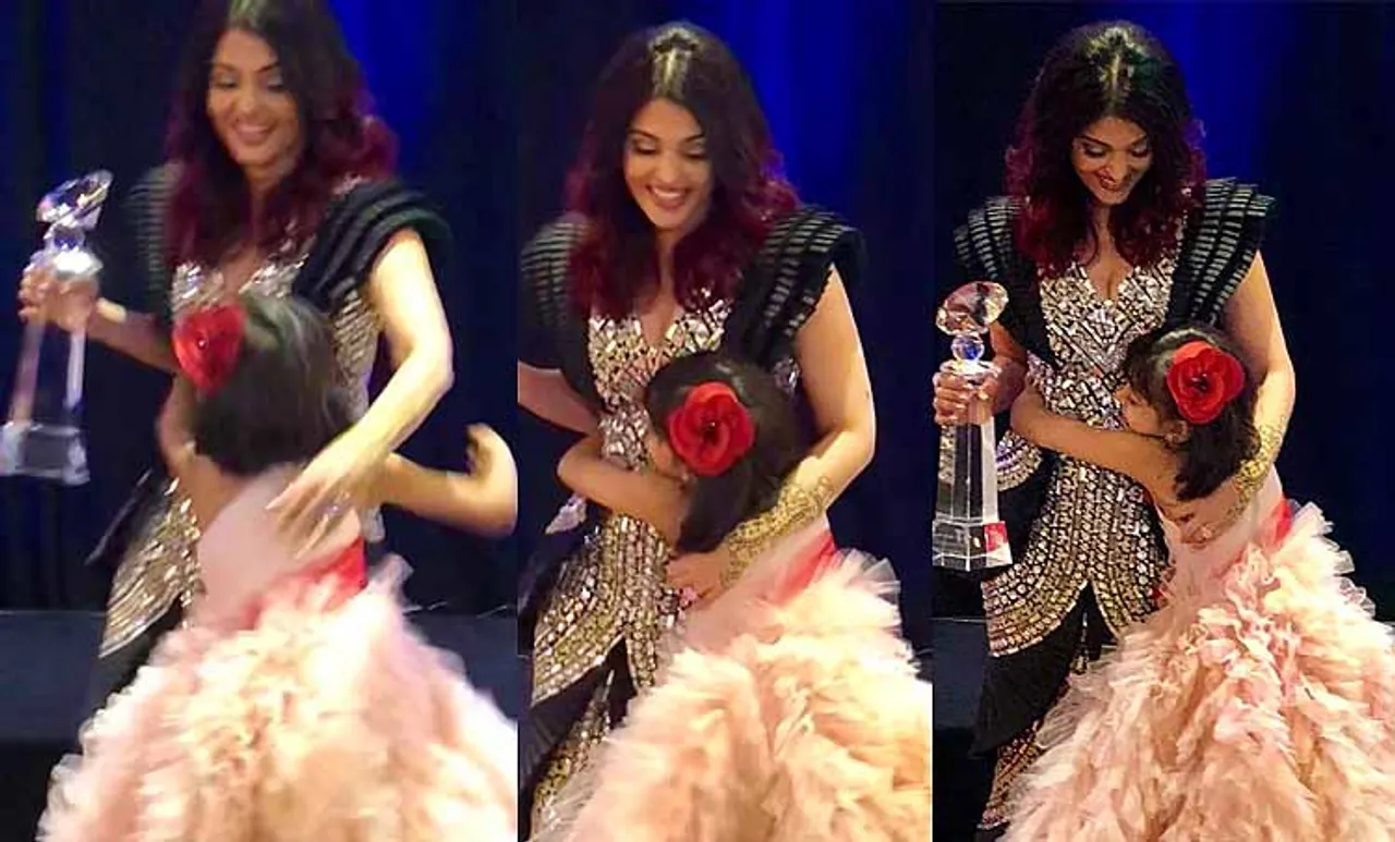 Aaradhya Bachchan hugs Aishwarya Rai as she receives Meryl Streep Award for excellence in Acting
