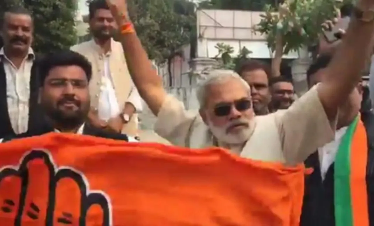 കോണ്‍ഗ്രസിന്റെ വിജയാഘോഷ റാലിയില്‍ ആനന്ദനൃത്തം ചവിട്ടി മോദിയുടെ അപരന്‍