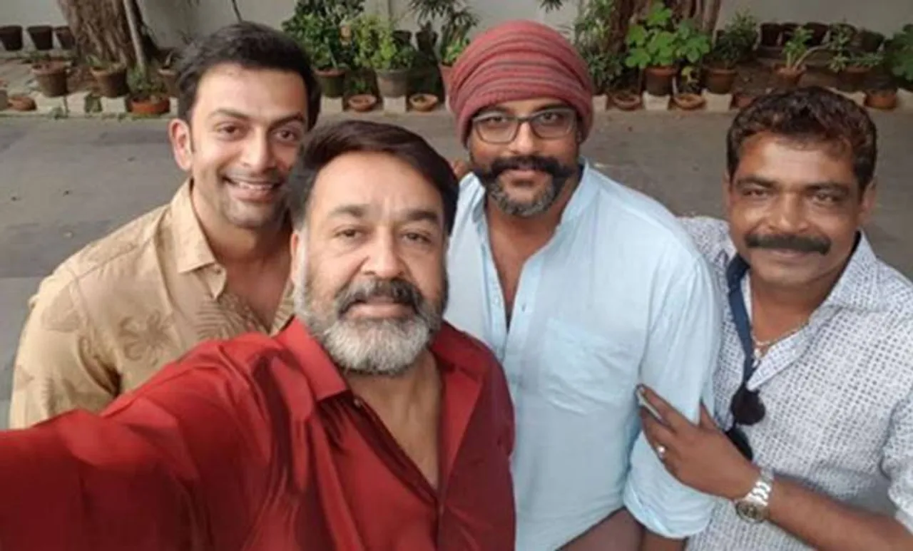 Empuraan, എമ്പുരാൻ, Lucifer 2, Empuraan title, എമ്പുരാൻ ലോഞ്ച്, ലൂസിഫർ 2, മോഹൻലാൽ, പൃഥ്വിരാജ്, മുരളി ഗോപി, ലൂസിഫർ രണ്ടാം ഭാഗം, മോഹൻലാൽ പൃഥ്വിരാജ്, Mohanlal, Prithviraj, Murali Gopi, IE Malayalam, ഐഇ മലയാളം