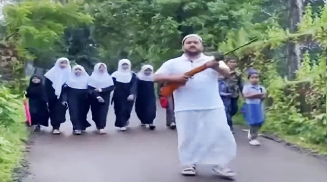 Stray dog menace, Gun- toting man escorts children to school, IE Malayalam