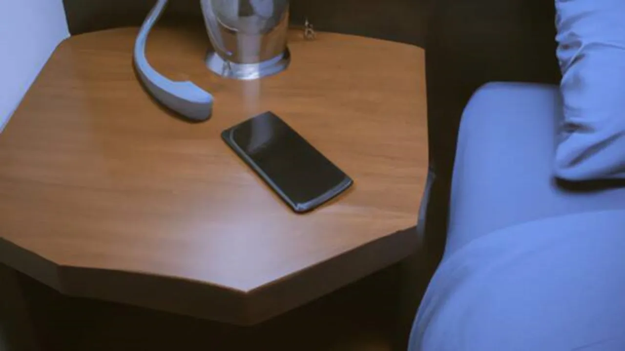 phone-on-bedside-table-dall-e