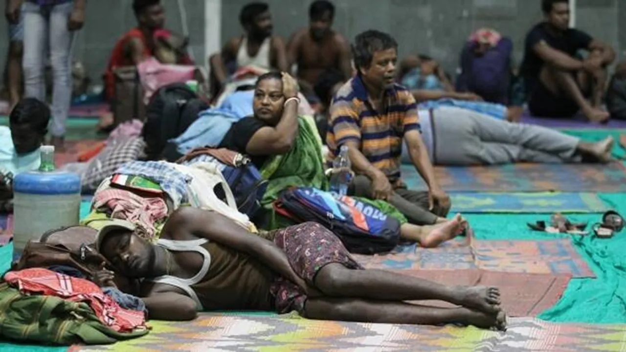 Families-evacuated-from-coastal-areas-at-a-shelter-in-Gandhidham-Kutch-on-Tuesday.-Nirmal-Harindran