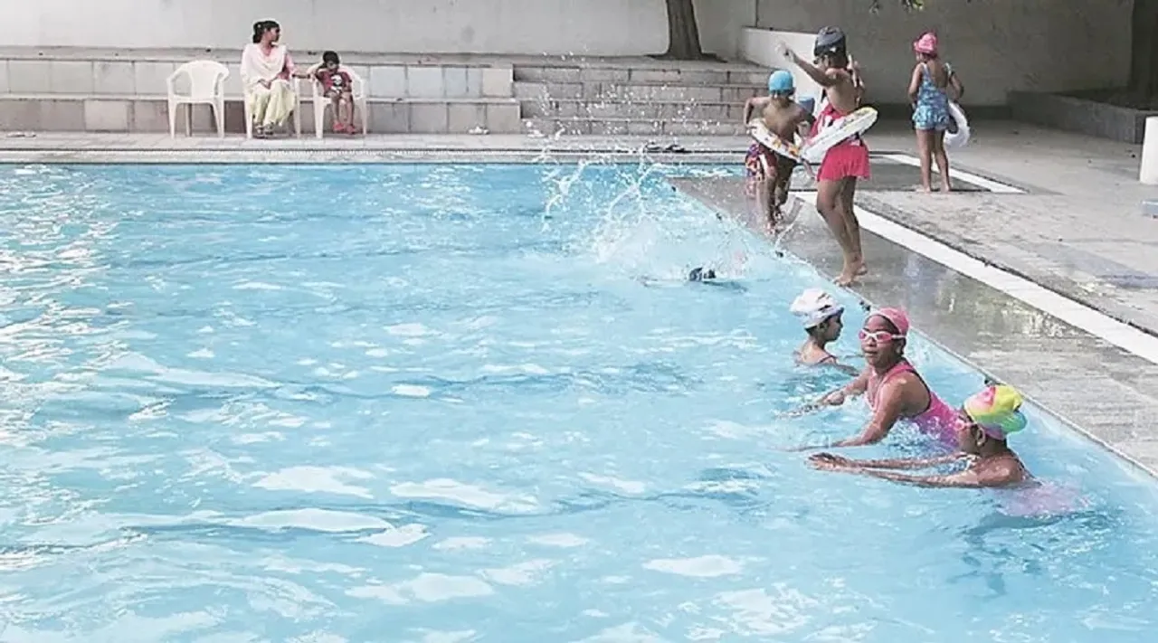 school students swimming