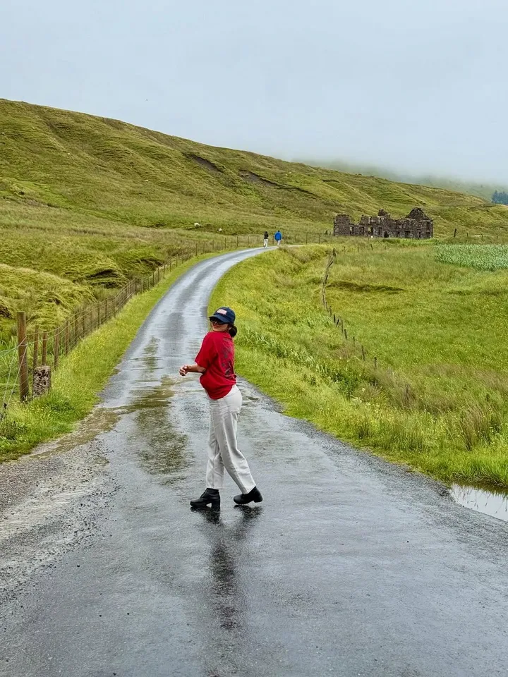 Dear diary,Today I went to Glencar Waterfalls.The sun forgot to sleep,and the mountains were wra