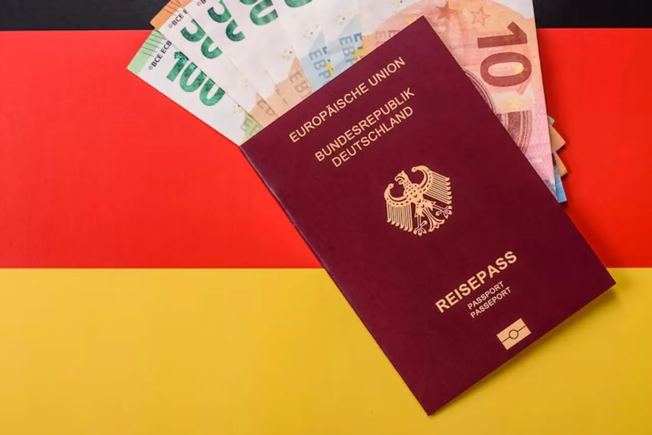 german-citizen-passport-against-background-german-national-flag_73989-93461