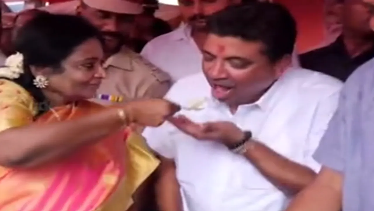 Tamilisai Soundararajan fed cake to PTR Palanivel Thyagarajan