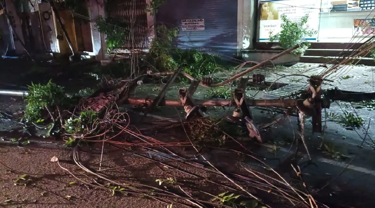 Madurai Heavy Rain uproots trees electric poles in city Tamil News 
