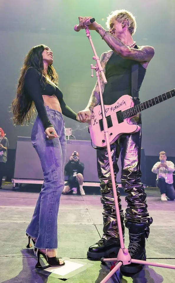 Machine Gun Kelly brings Megan Fox on Stage During Indy 500 Weekend.
