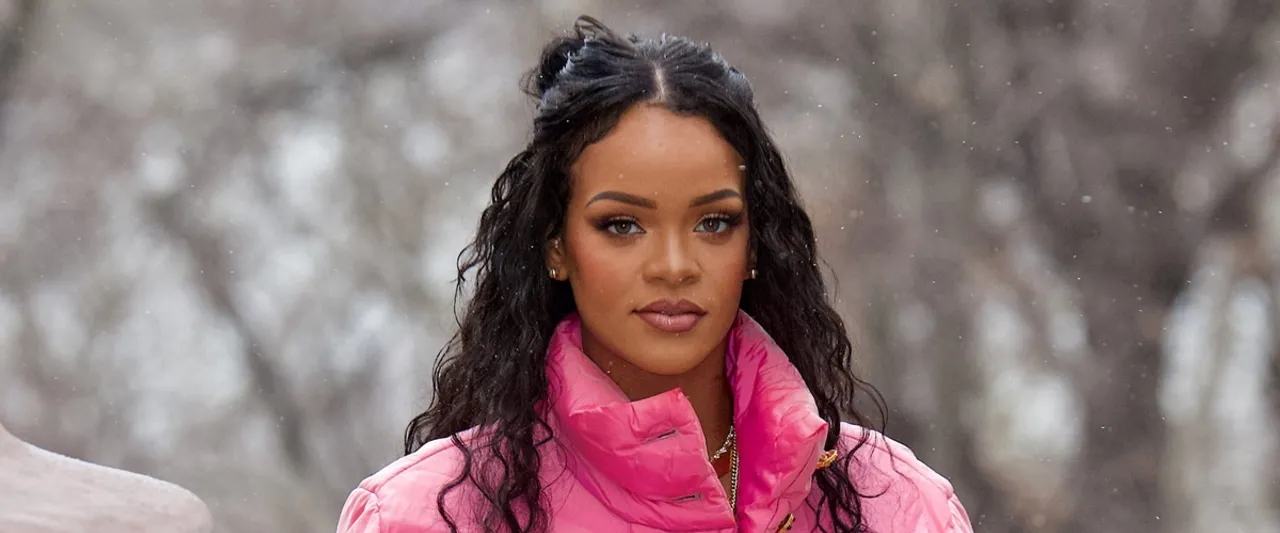 Rihanna Attends Lollapalooza Paris in Chic Sporty Ensemble to Support A$AP Rocky