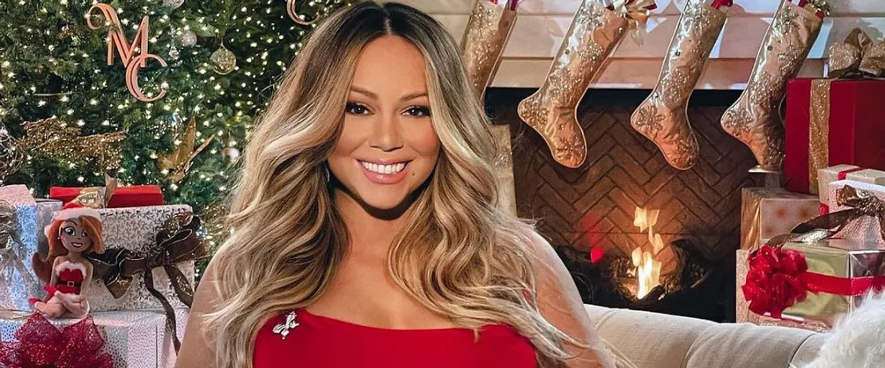 Mariah Carey Performs With Daughter Monroe at Christmas Concert