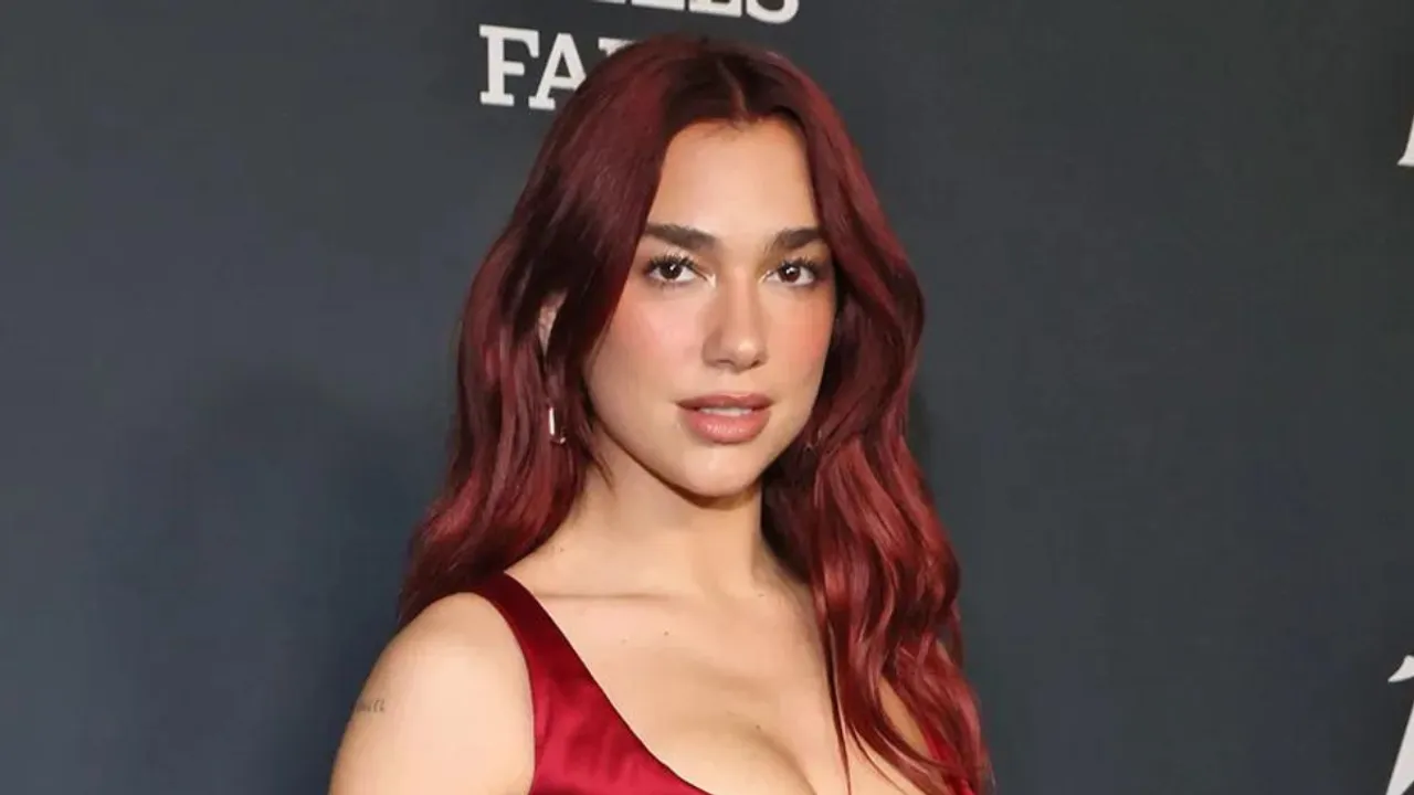 Dua Lipa's 'Radical Optimism' Soars to the Top Spot in the U.K. Charts, Marking Her First No. 1 Album