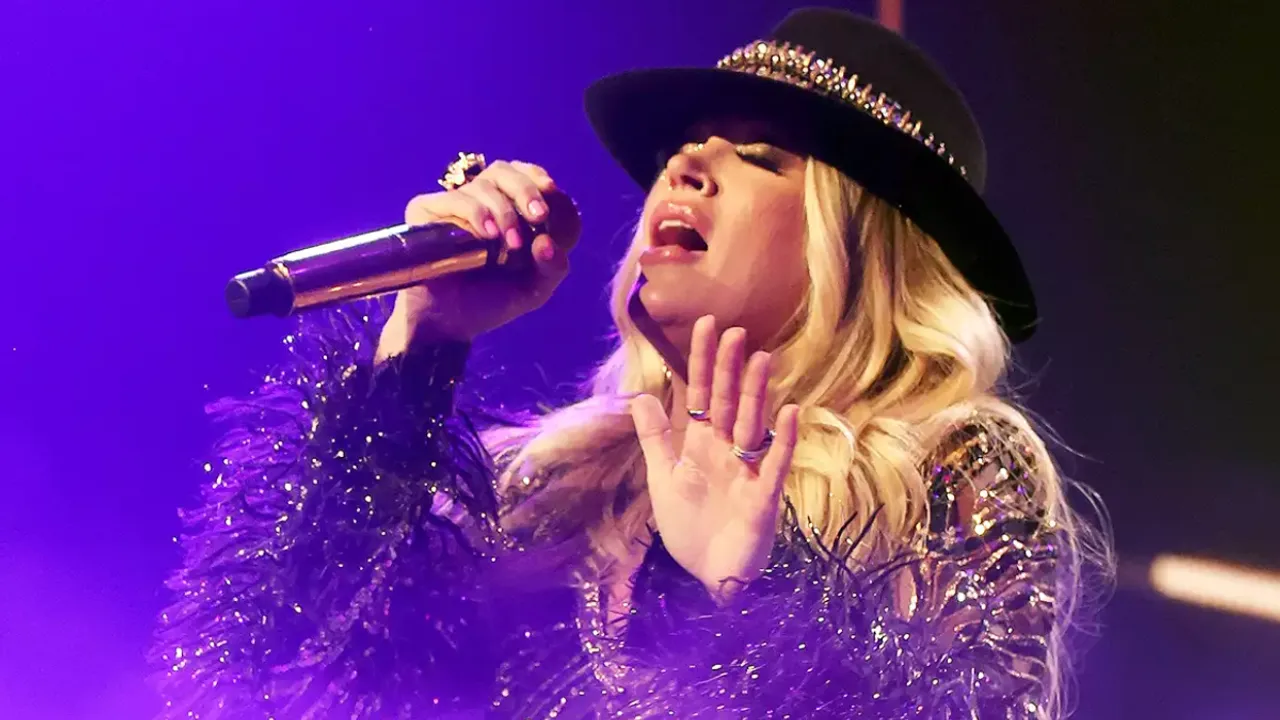 Carrie Underwood Falls in the Rain at Concert: 'Won't Let a Little Rain Stop Us!'