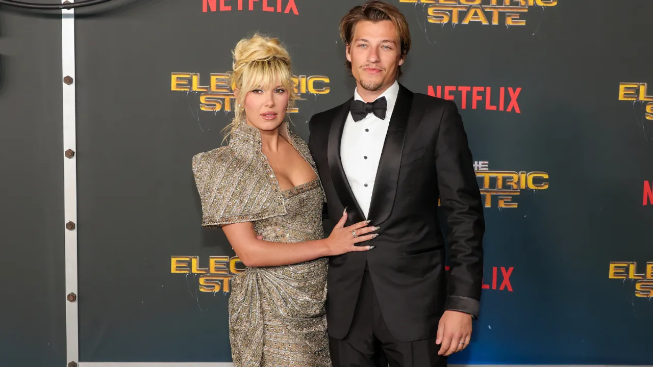 Millie Bobby Brown & Jake Bongiovi Stun in Glamorous Red Carpet Looks at ‘The Electric State’ Premiere