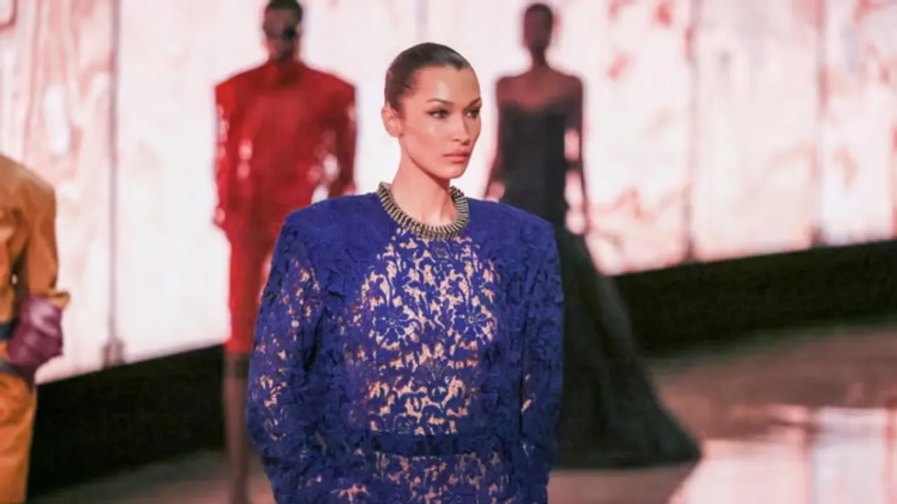 Bella Hadid Stuns in Sheer Lace Dress at Saint Laurent Paris Fashion Week Finale