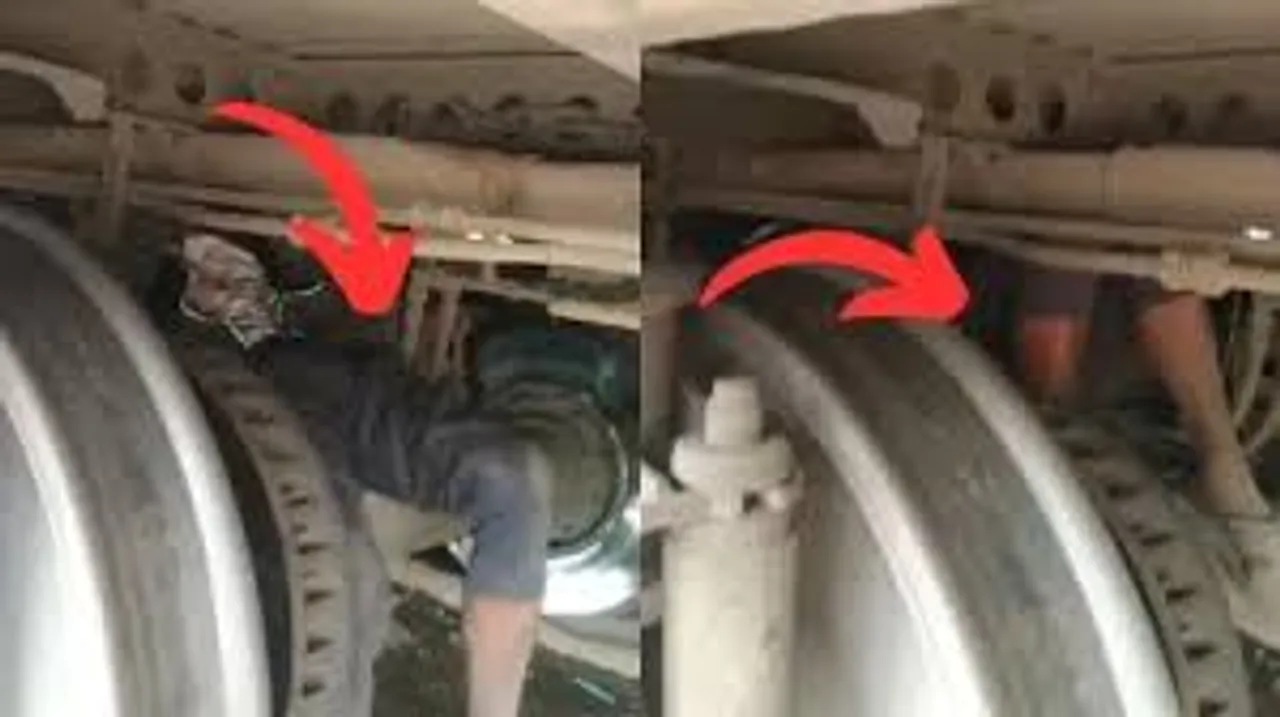 man under train