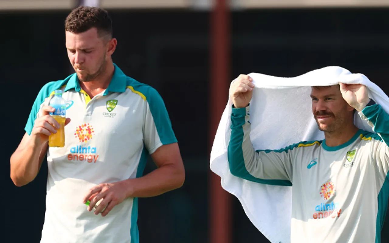 Josh Hazlewood and David Warner (Source - Twitter)