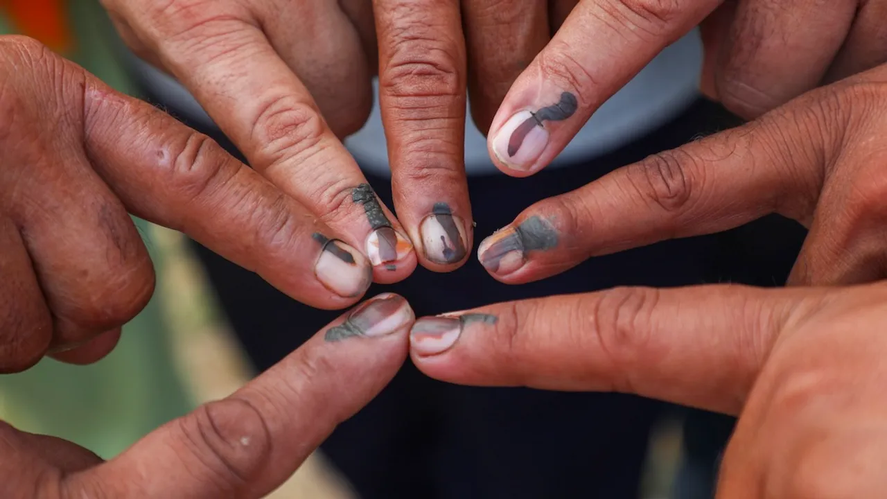 Voters show their inked fingers after casting votes during the second phase of Jammu and Kashmir Assembly elections, in Nowshera of Rajouri district, J&K, Wednesday, Sept. 25, 2024.